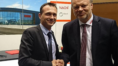 Xavier Nicod, Procomo NIKKEN local Sales Manager being congratulated by NIKKEN Europe CEO & President, Tony Bowkett