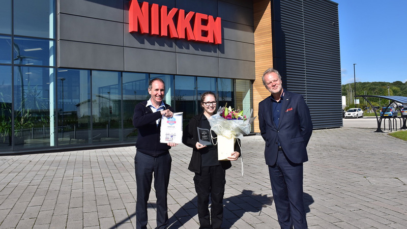 Kirbi celebrate Apprentice of the Year award with CEO and President , Tony Bowkett, at the NIKKEN Innovation Centre. 